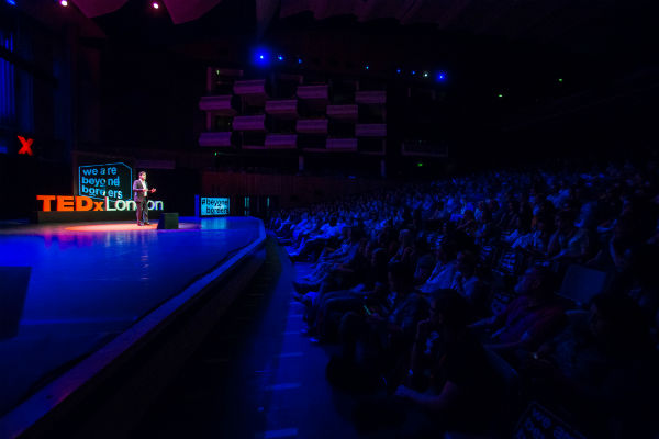 Simon Bucknall delivering opening speech at TEDxLondon - July 2018